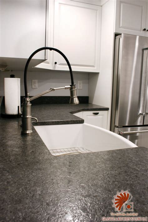 steel gray leathered granite with white cabinets|white granite for cabinets.